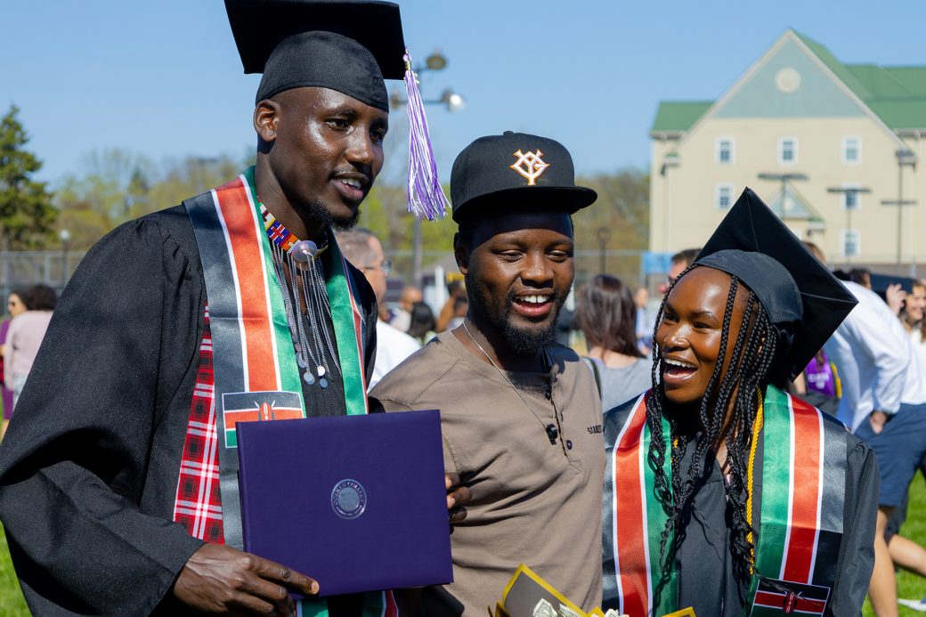students celebrating their graduation