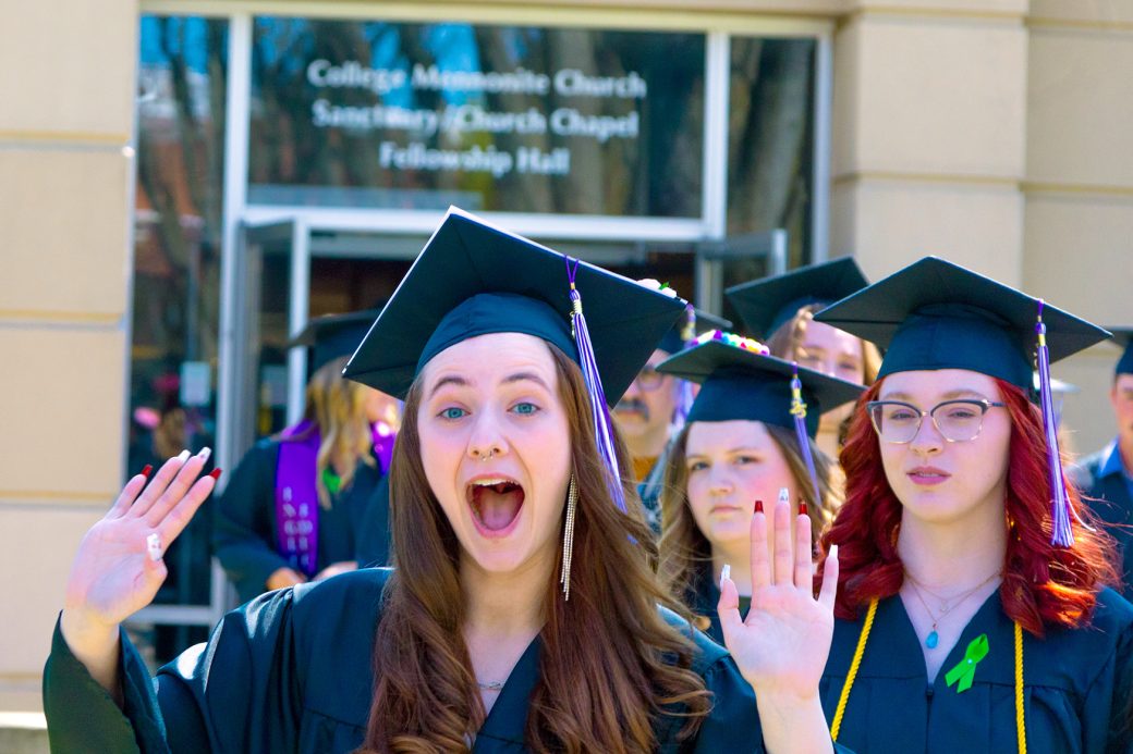 students celebrating their graduation