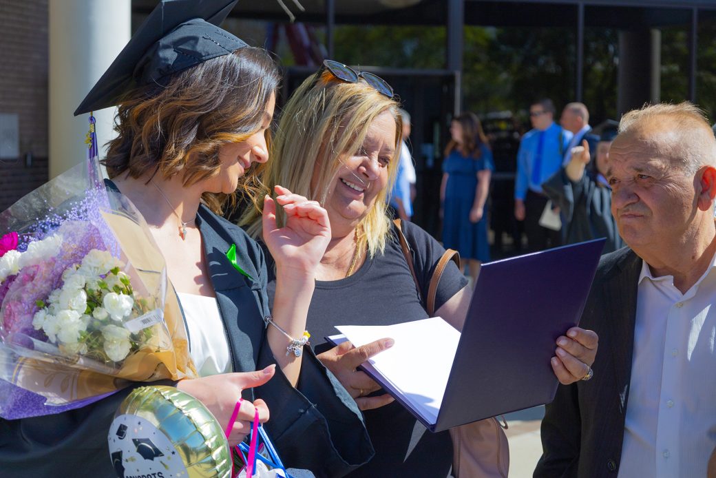 students celebrating their graduation