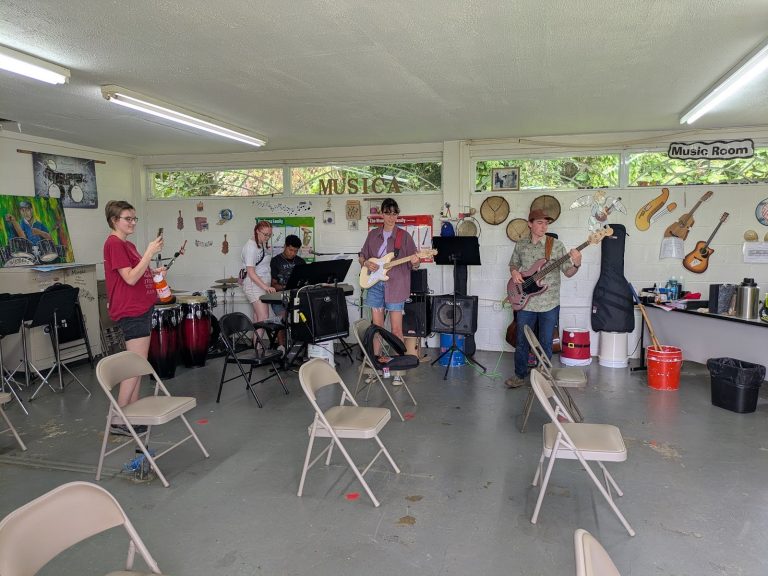 Students playing instruments in a classroom on SST