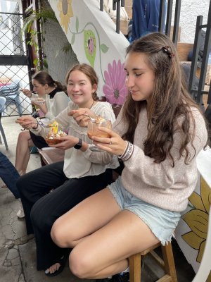 students trying food