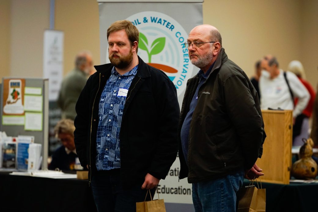 Two men talking at Michiana Regional Seed Swap