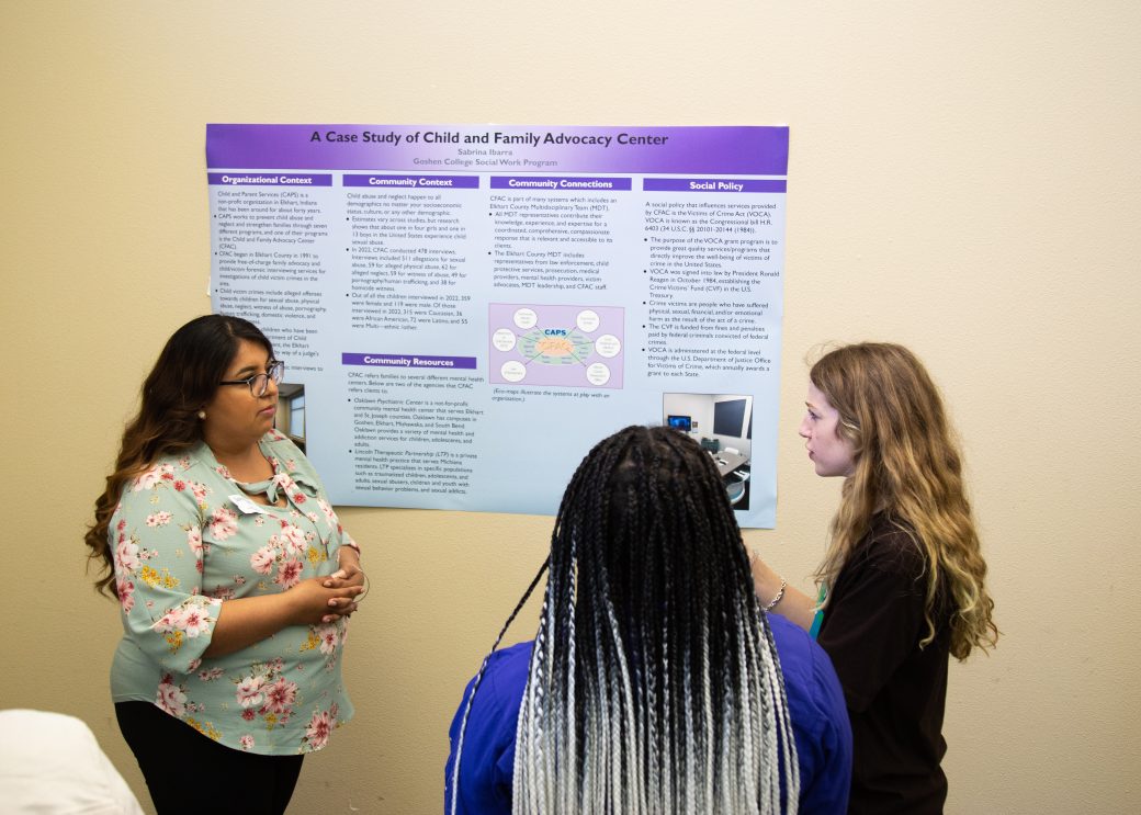 Woman doing a presentation at Academic Symposium 2023