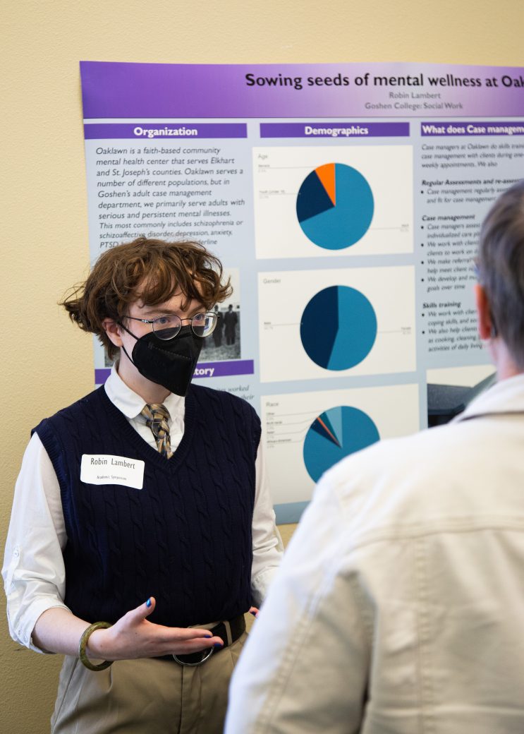 Man doing a presentation at Academic Symposium 2023
