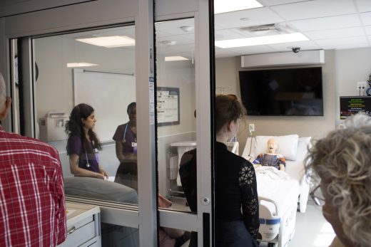 Nursing students in one of the hospital room simulation labs