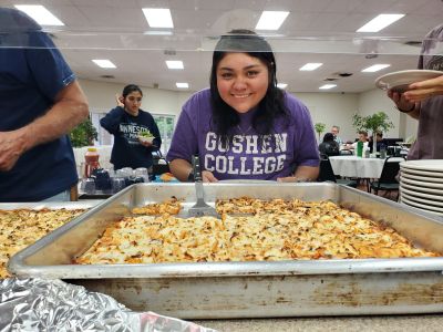 Student serving food on SST at a US disaster site