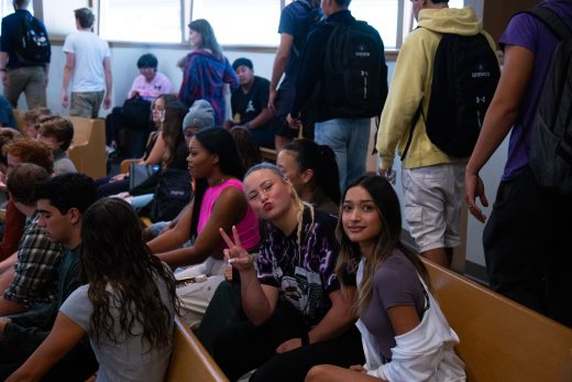 Goshen college students smling and posing to the camera