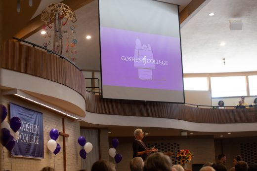 Woman doing a presentantion on the stage at Opening Convo