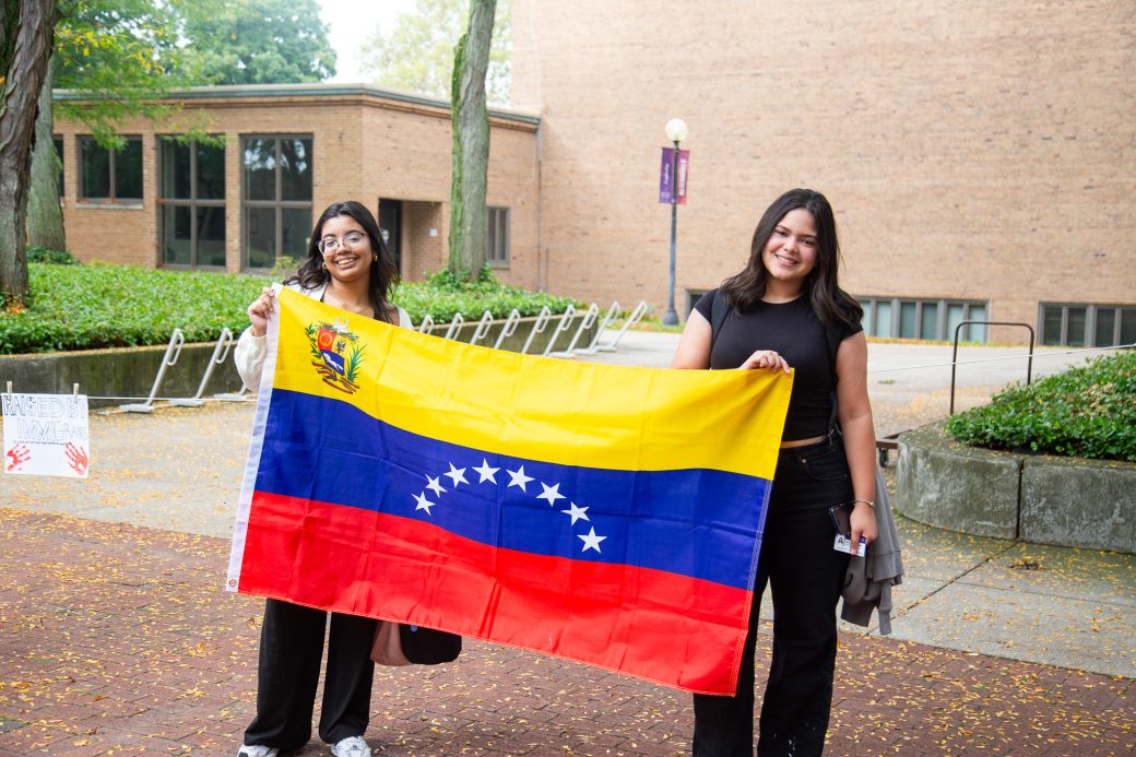 People with Venezuela's flag at Convocation and Celebration