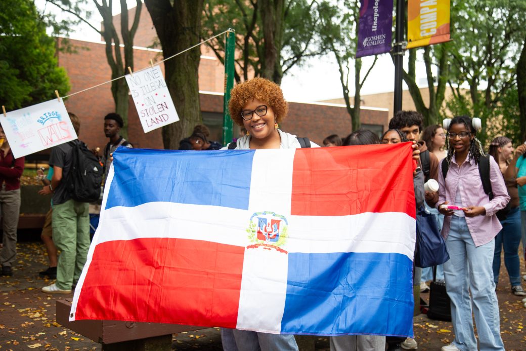 People with Dominican Republic's flag at Convocation and Celebration