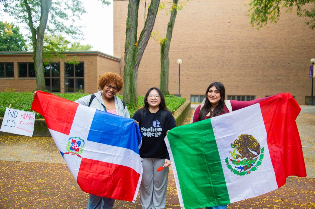 people with their countries' flags