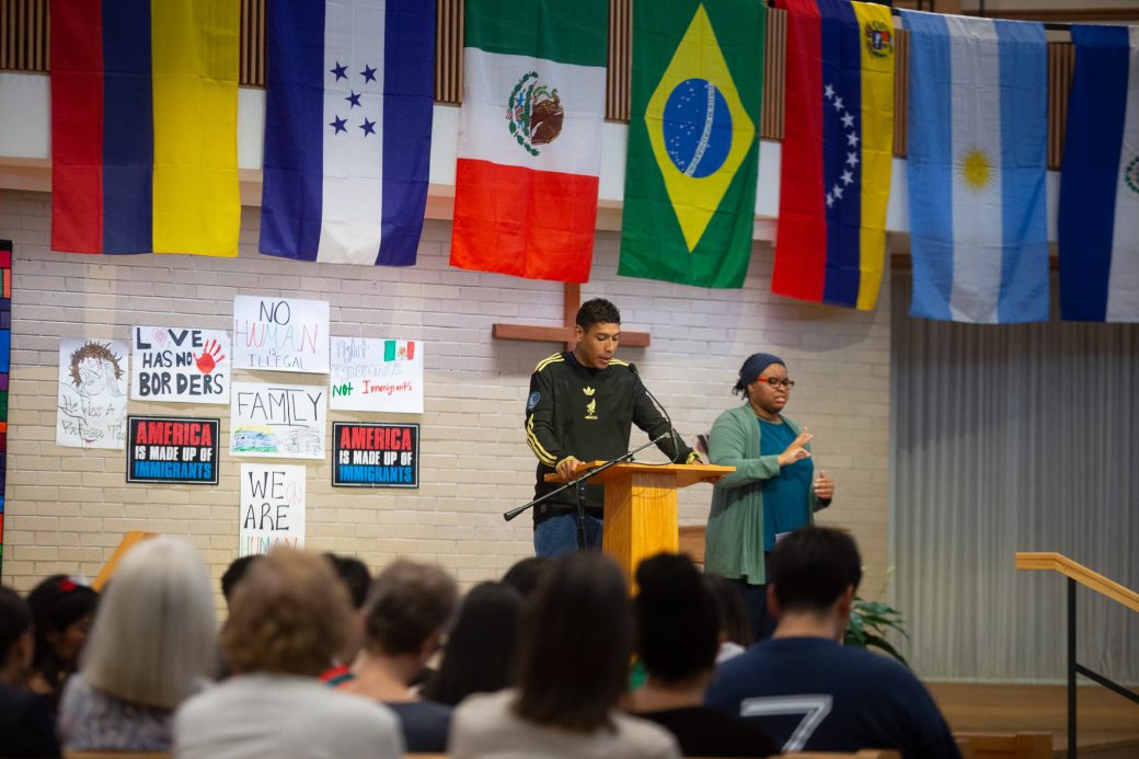 Men having a speech at pulpit at the Hispanic Heritage Month Convocation and Celebration