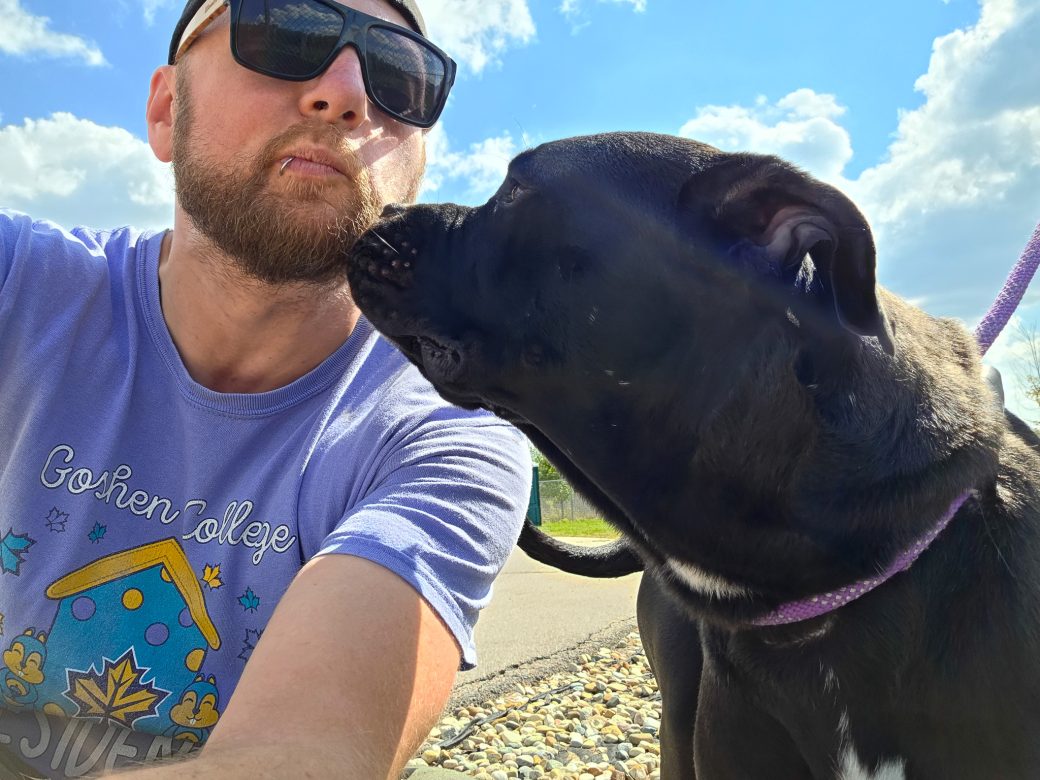 Man enjoying with a dog