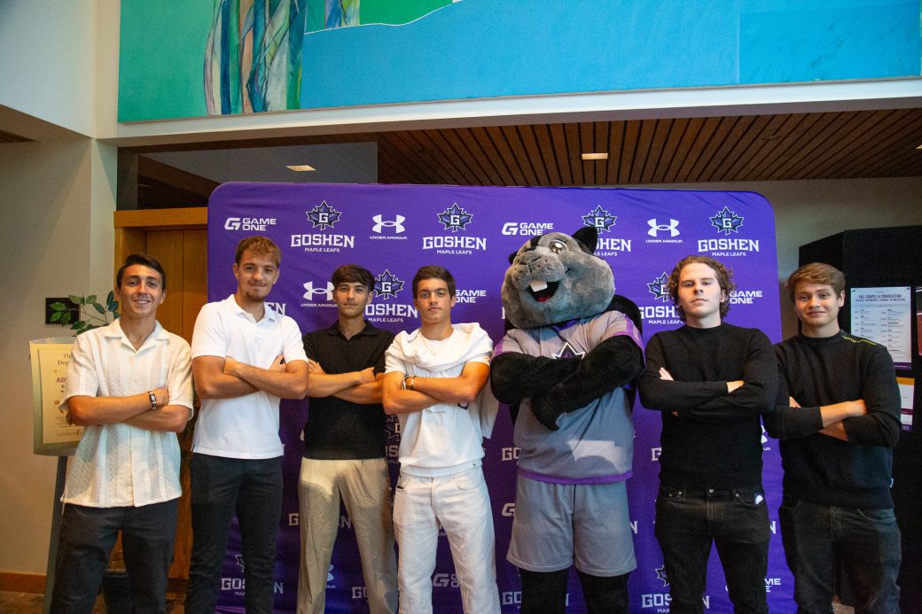 Dash poses with group of male friends