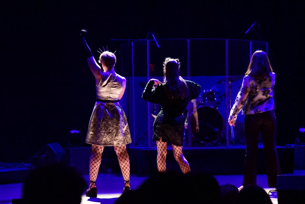 Three woman dancing at stage of 2025 kick off