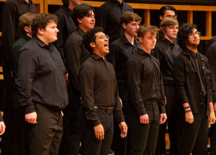 men in concert balack singing