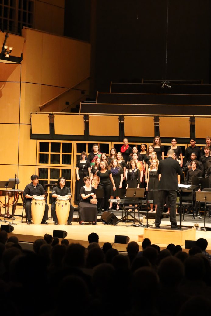 Students performing during homecoming gala