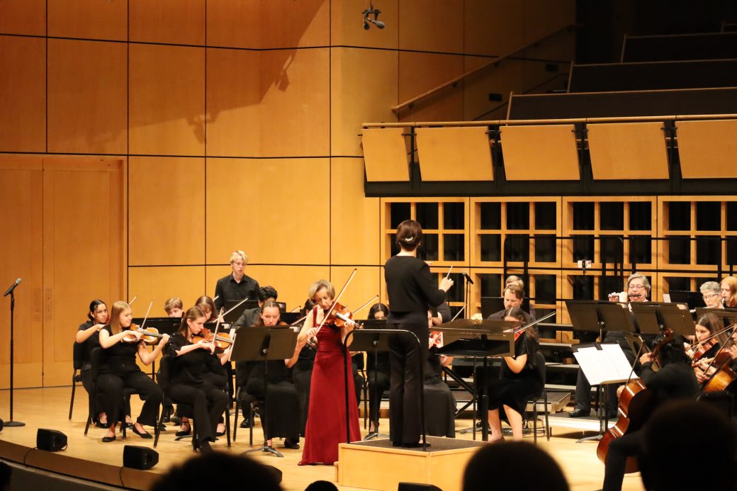 Students performing during homecoming gala