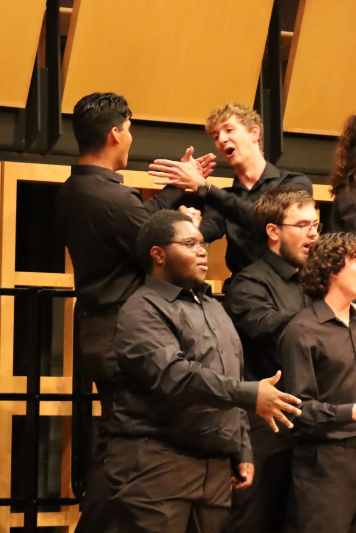 Students performing during homecoming gala