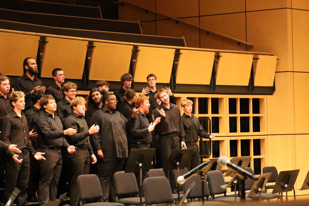 Students performing during homecoming gala