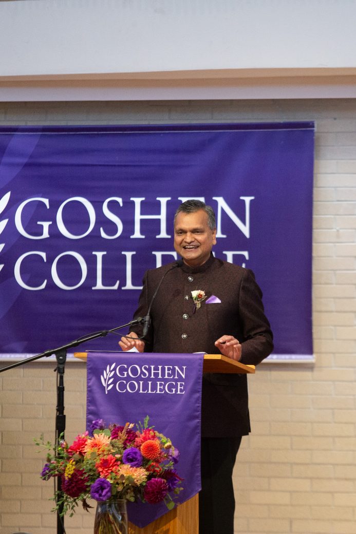 Men doing a speech at the stage at Goshen College
