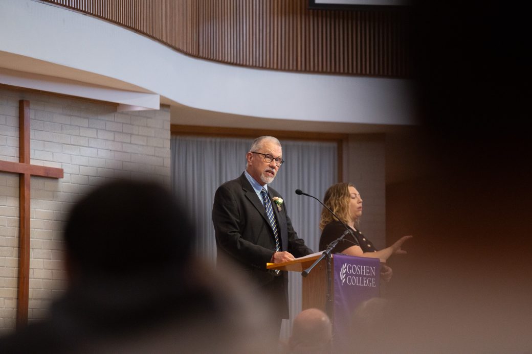 Man doing a speech at Alumni Awards Convocation