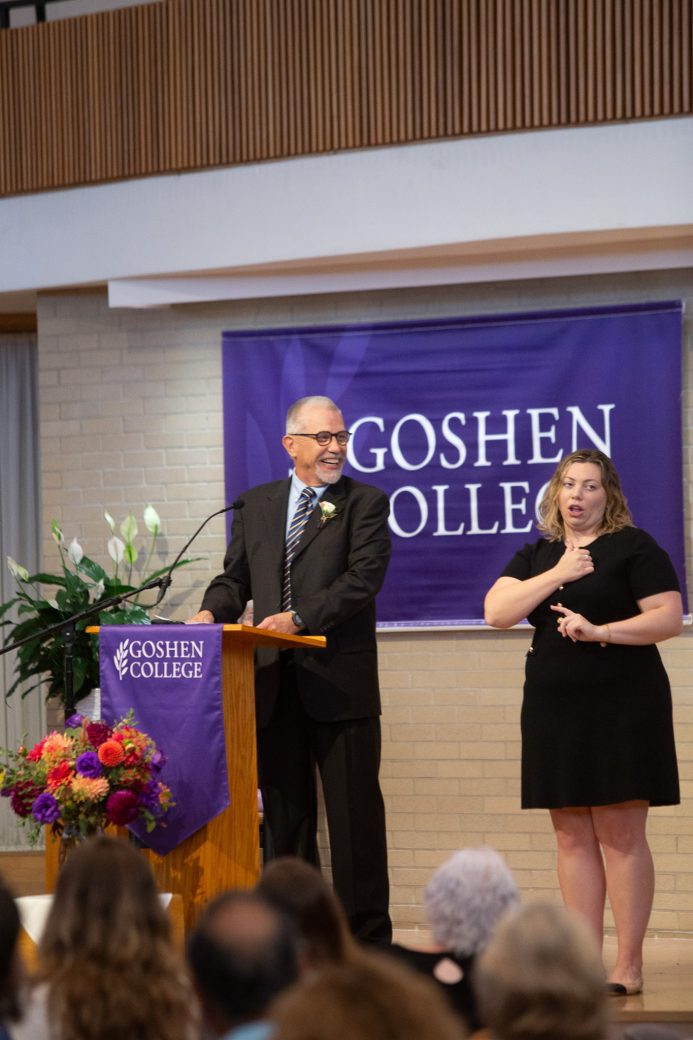 Man smiling at Alumni Awards Convocation