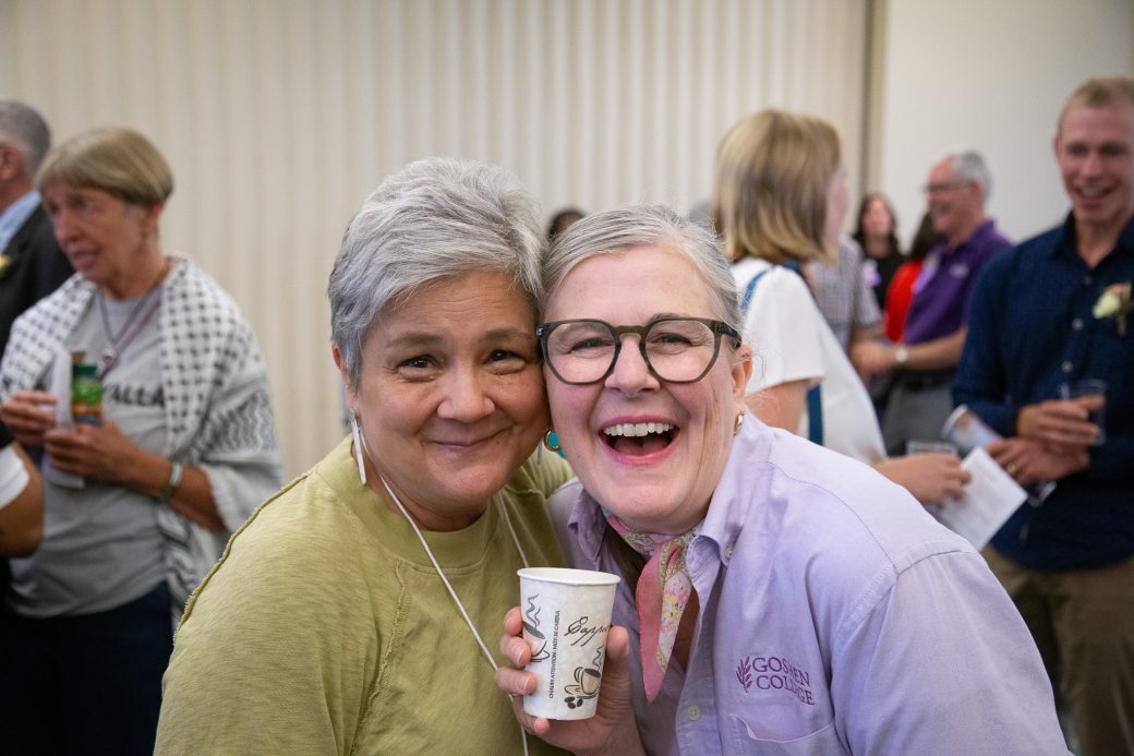Two women smiling to the camera