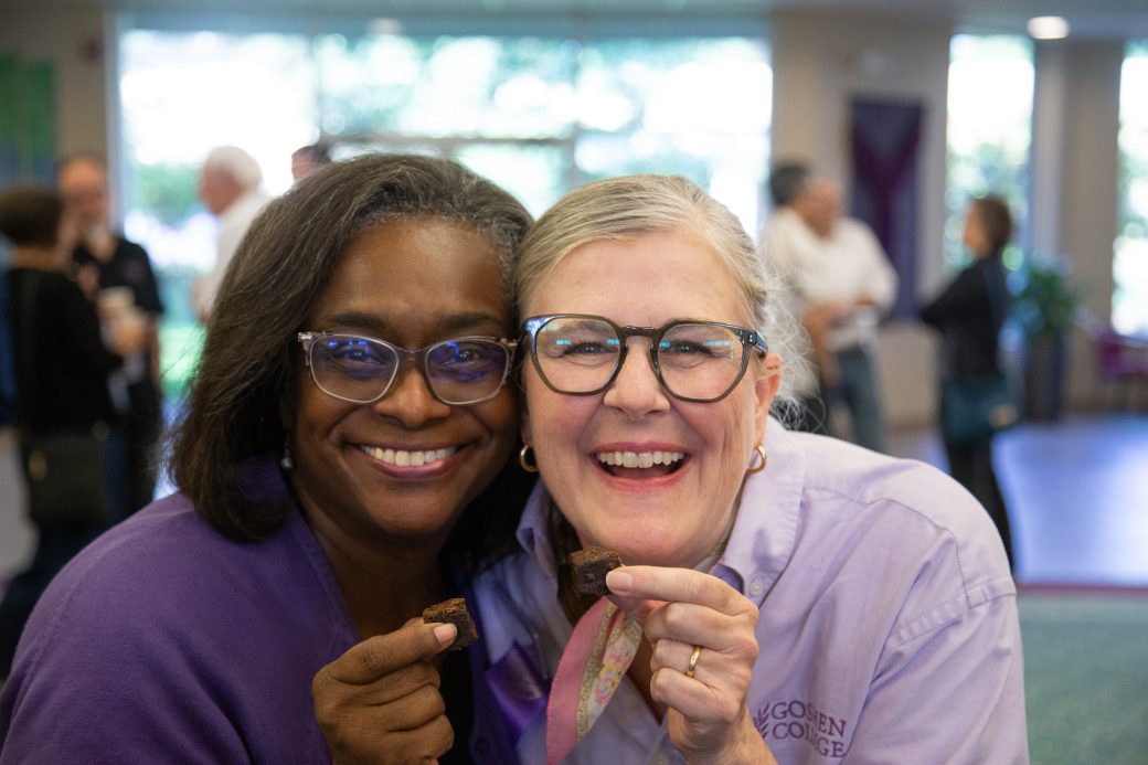 Two women smiling to the camera