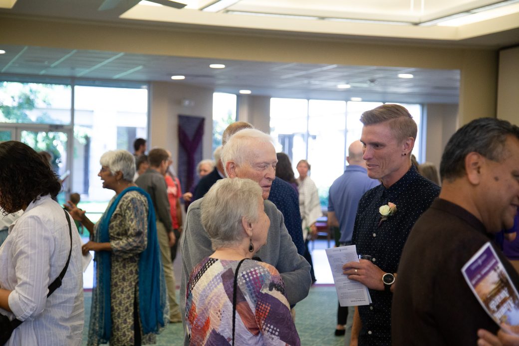 People talking at 2025 Alumni Awards Convocation