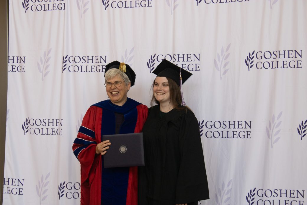 Two woman smiling for a camera