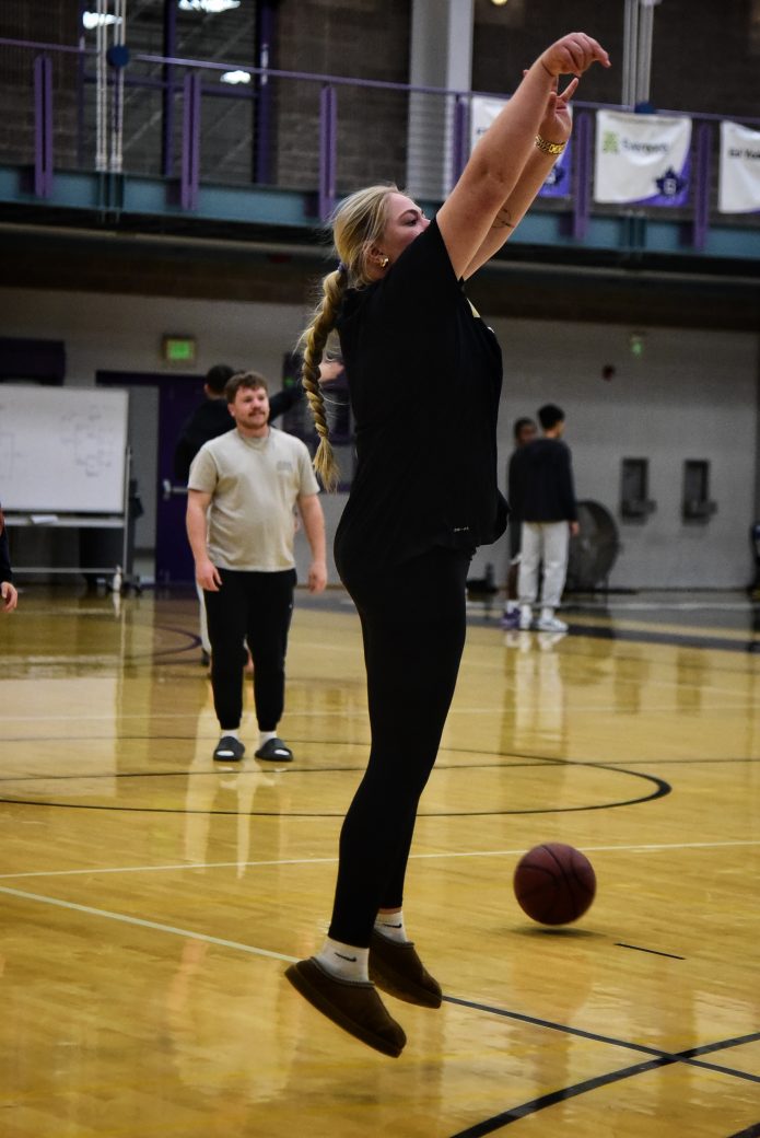 Female player jumping making a shot