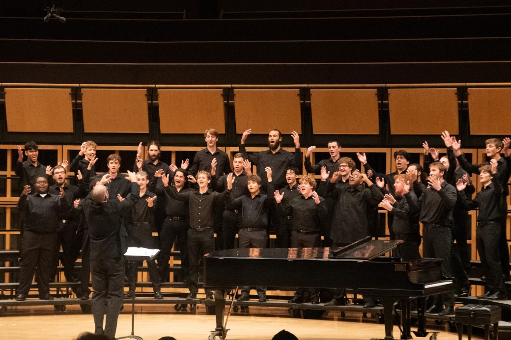 Students perform on stage