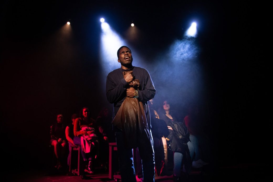 Student performing in Fall mainstage, RENT