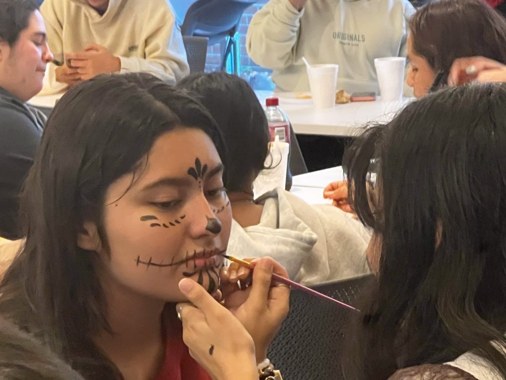Face painting at LSU's Dia De Los Muertos celebration.
