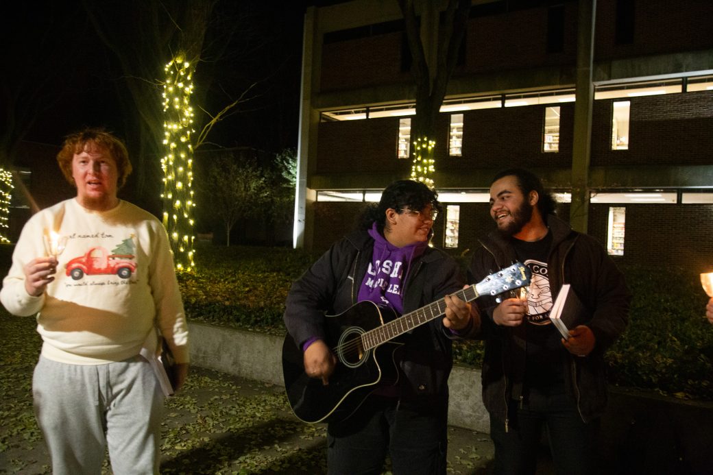Students sing at the Campus Lighting and Welcoming Advent event.
