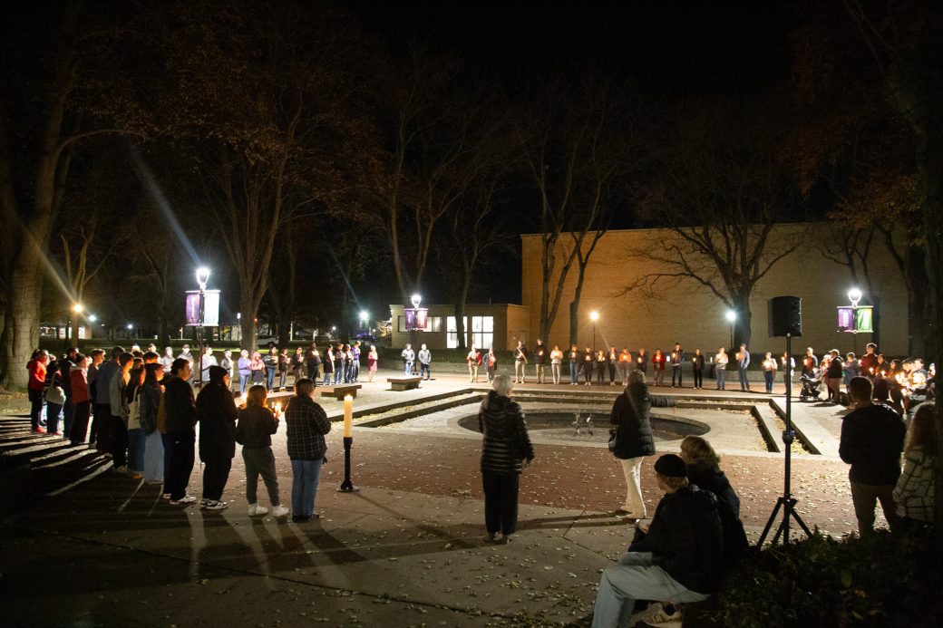 Students and faculty gathered at the Campus Lighting.
