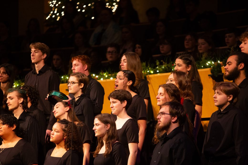 Students in black singing