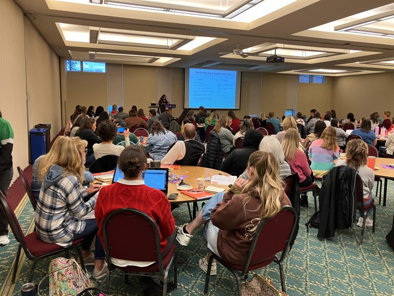The audience listens to Dr. Elsa Cárdenas-Hagan at the Science of Reading Summit.