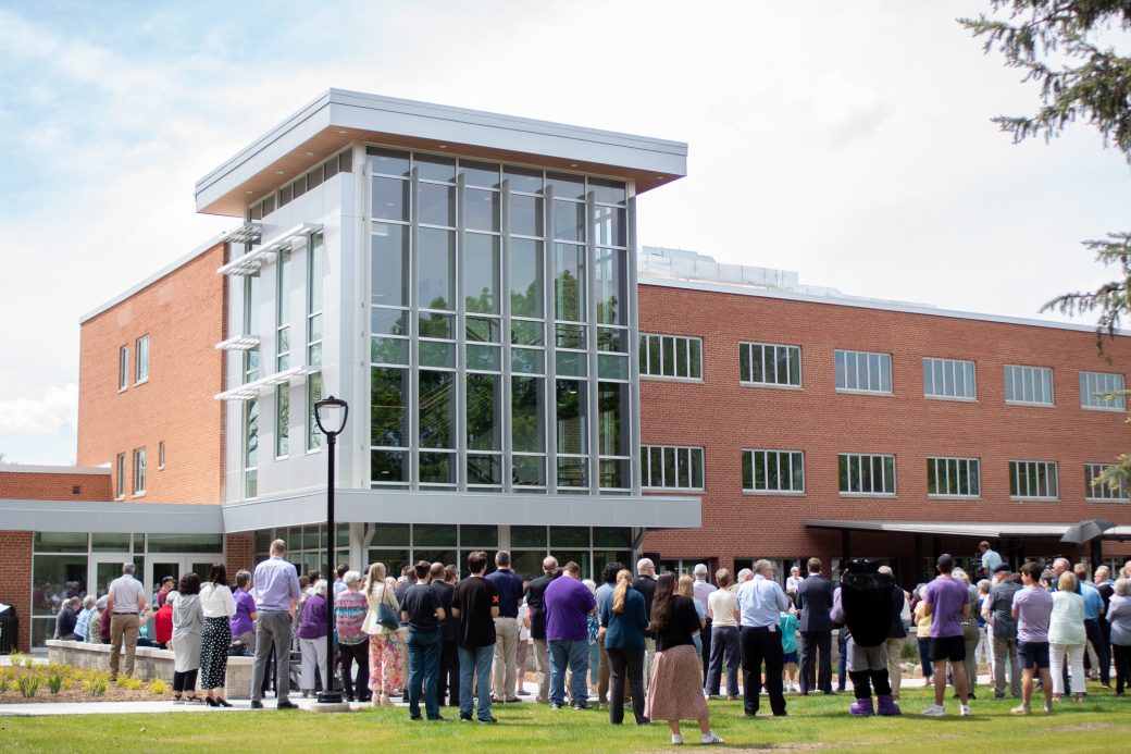 Crowd outside Westlawn building as part of opening ceremony
