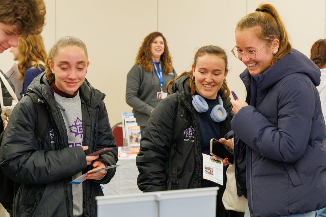 Sports students laughing.