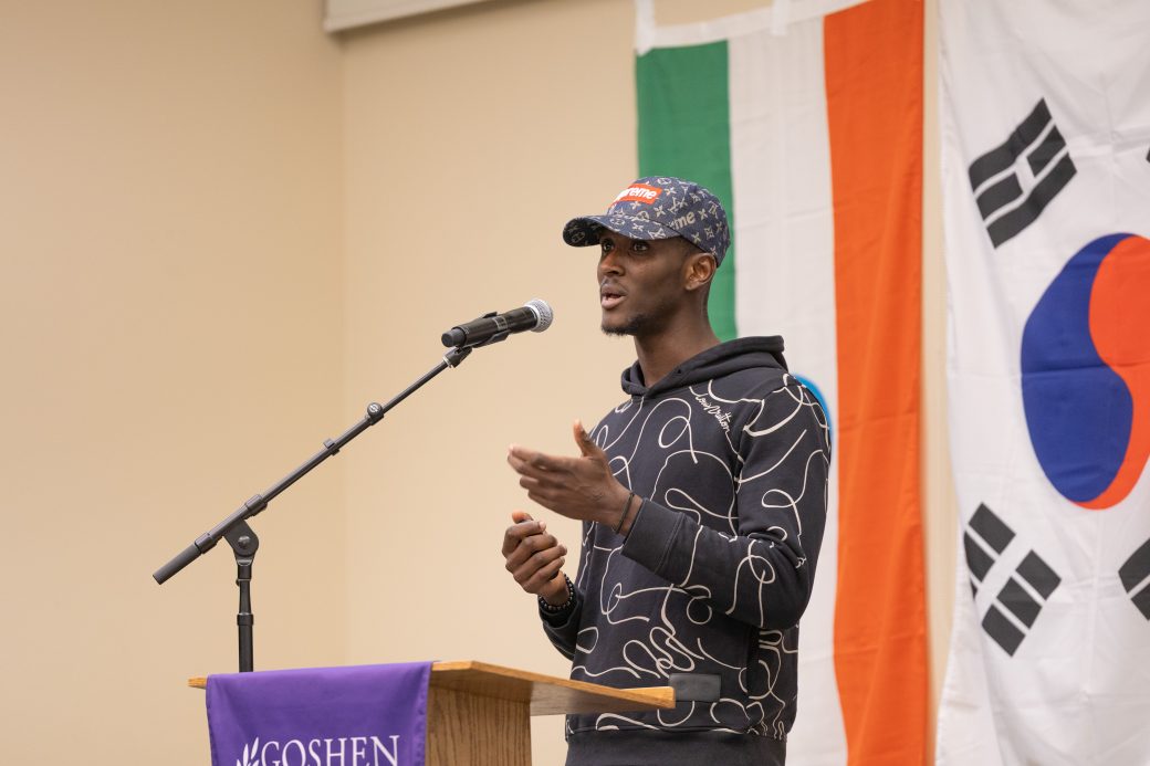 Man speaking into microphone