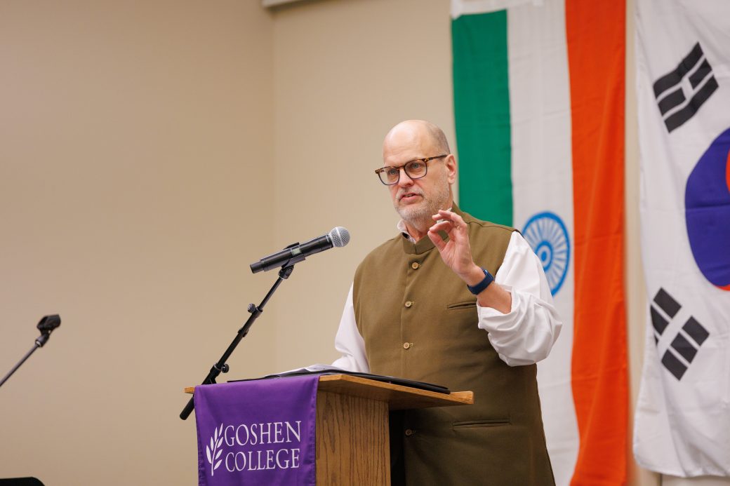 Man speaking into microphone