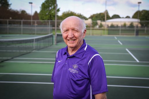 headshot of Stan King on tennis courts