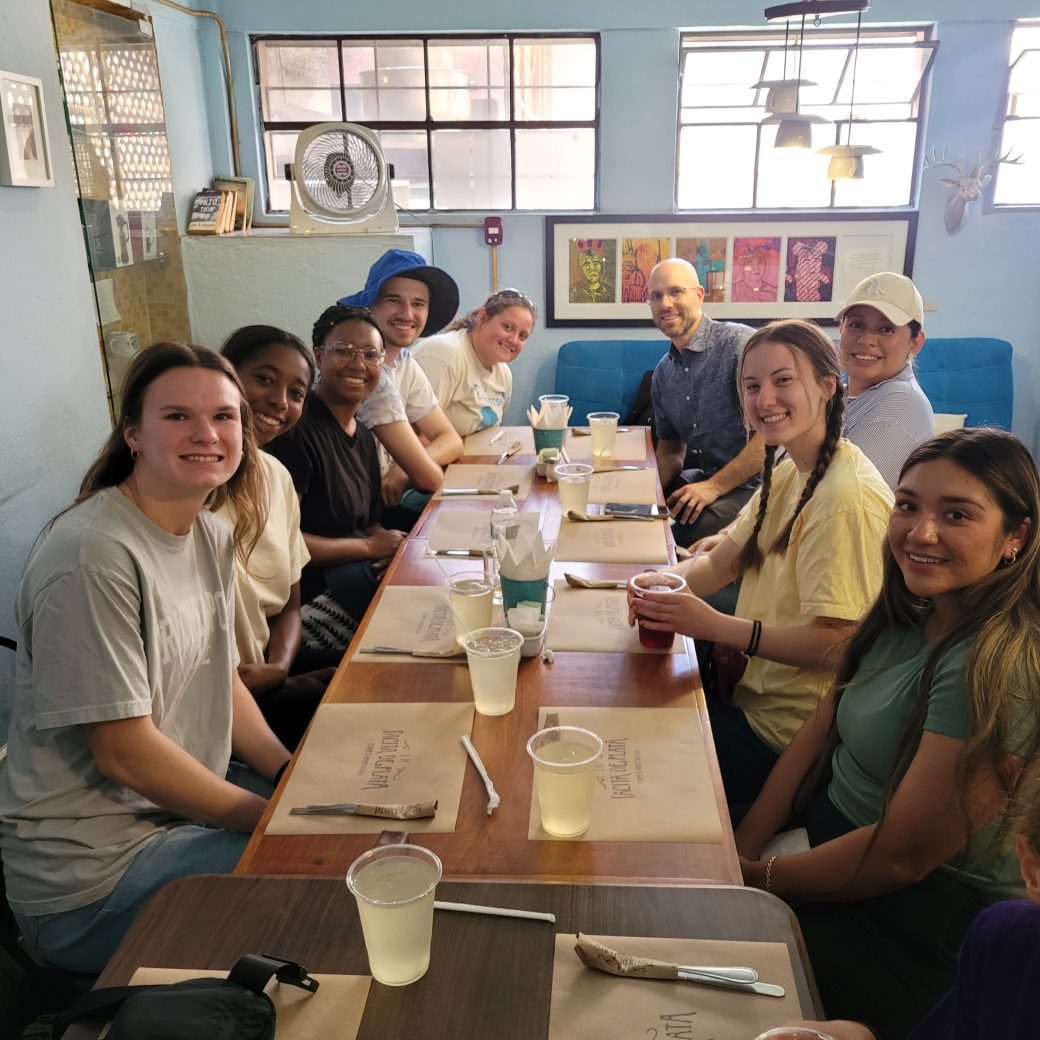 People gathered around a table for lunch.
