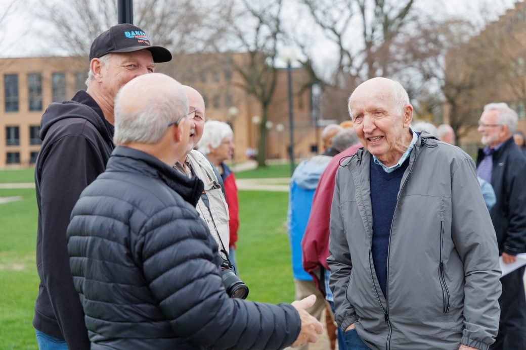 Group talking to Stan