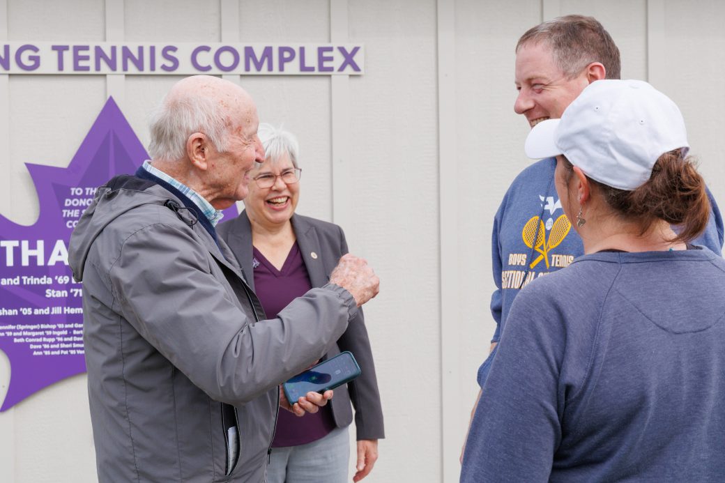 Group talking with Stan