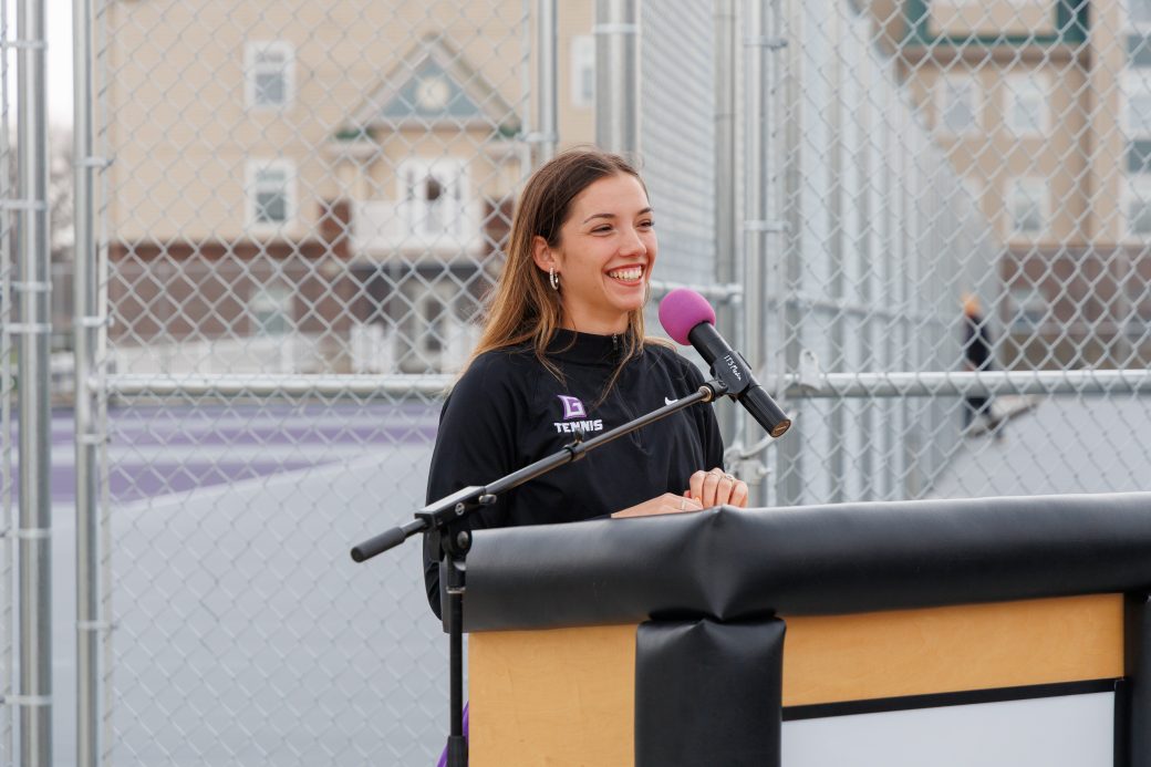 Student speaking at podium