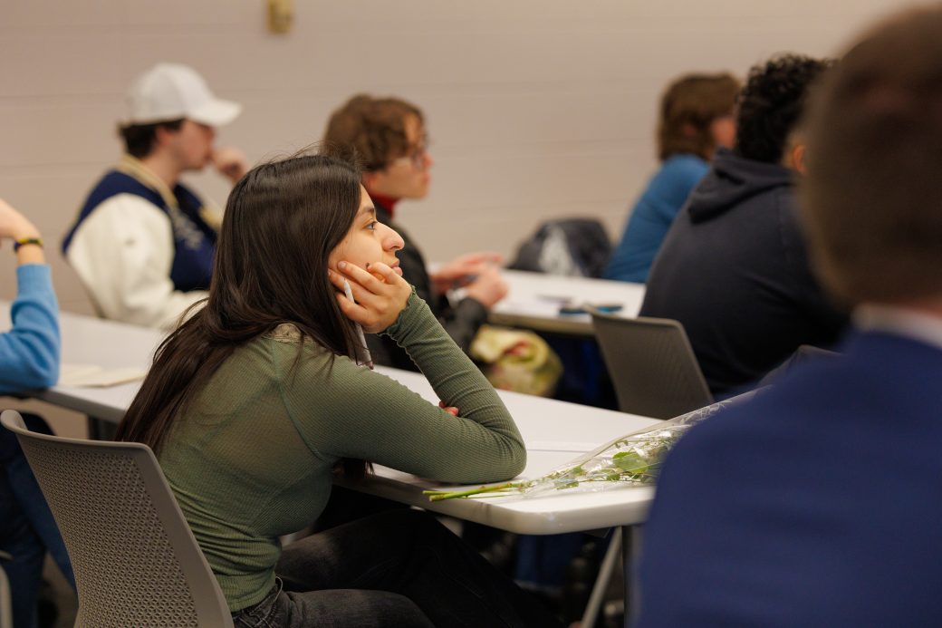 Student listening in audience