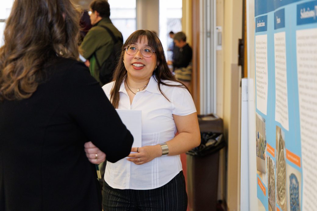 Student talking about poster
